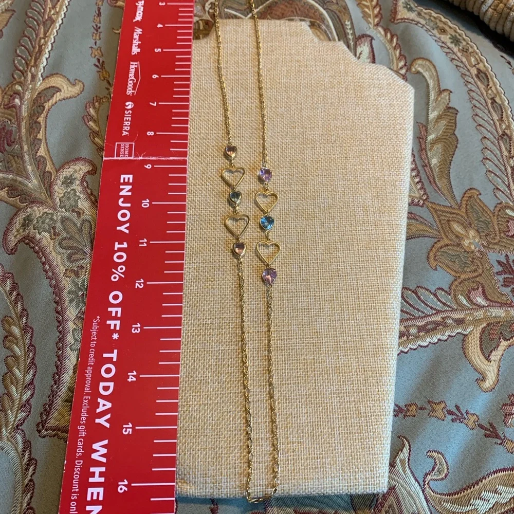Vintage Avon pink and blue hearts necklace.